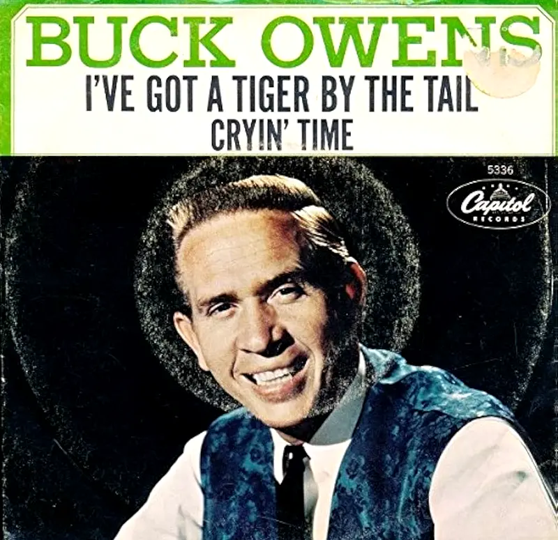 Buck Owens - I've Got A Tiger By The Tail (1965).webp